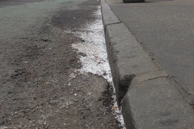 Styrofoam lines a gutter in Midtown.